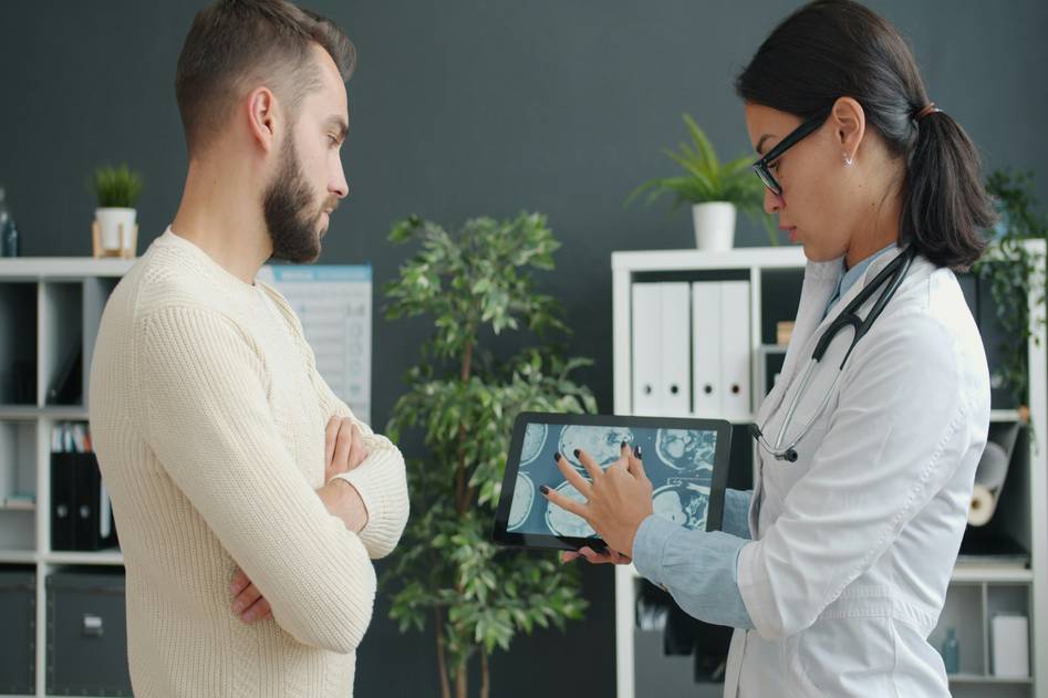 Blog homepage hero image showing open medical dictionary, stethoscope, and translation notes on wooden desk