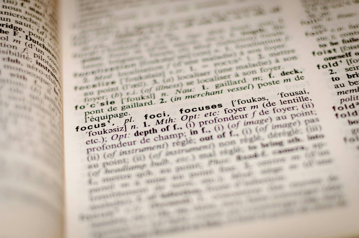 Certified translator reviewing translation for medical terms in clinical trial document
